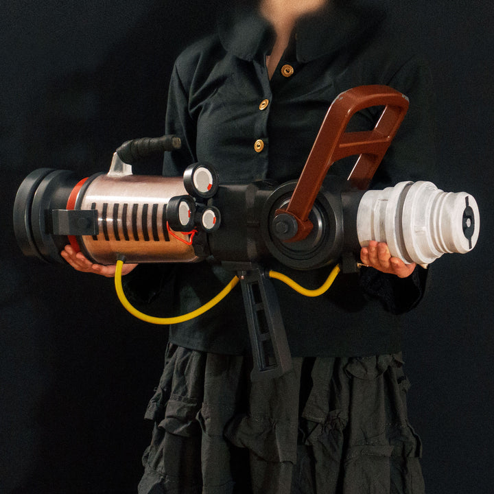 Arkan holding a Team Fortress 2 cosplay prop Quick Fix from Meet the Real Medic from the red team