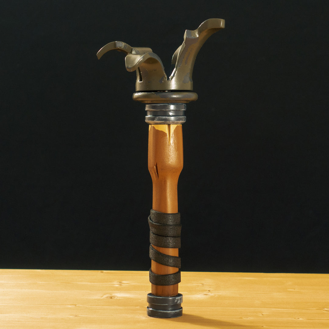 A TF2 Caber Prop for your cosplay and collection! Comes with 2 swappable heads secured with a strong magnet at the center of the handle. Serials is hand cut varnished over so it never fades.