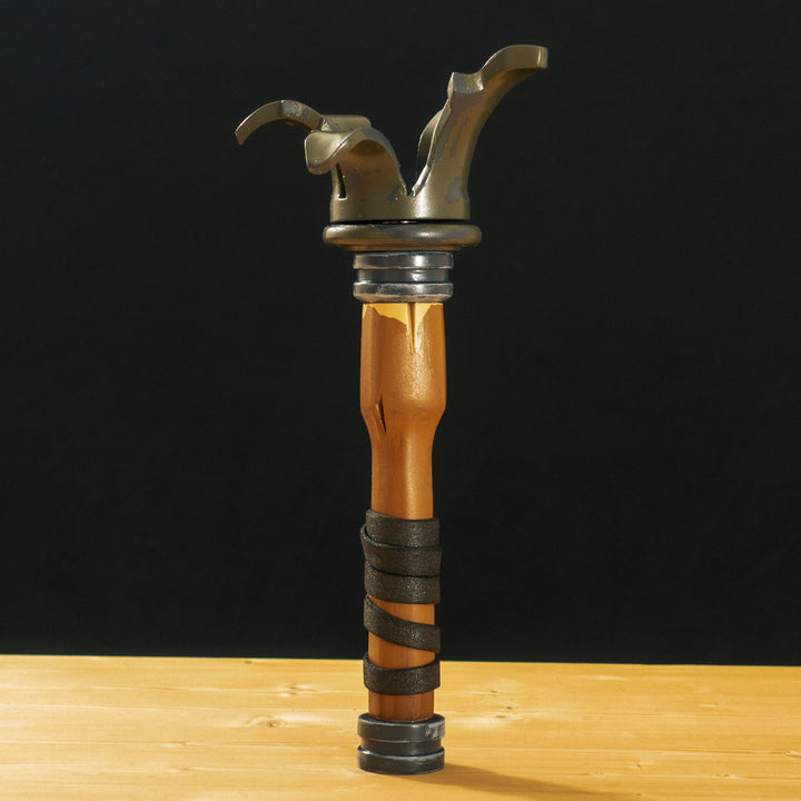 A TF2 Caber Prop for your cosplay and collection! Comes with 2 swappable heads secured with a strong magnet at the center of the handle. Serials is hand cut varnished over so it never fades.