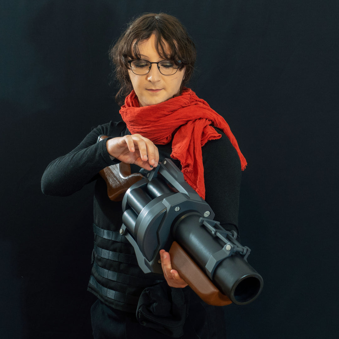A TF2 Demoman Pipe Launcher prop with moving parts for cosplay or collection! Has the fake glowing projectiles available!  