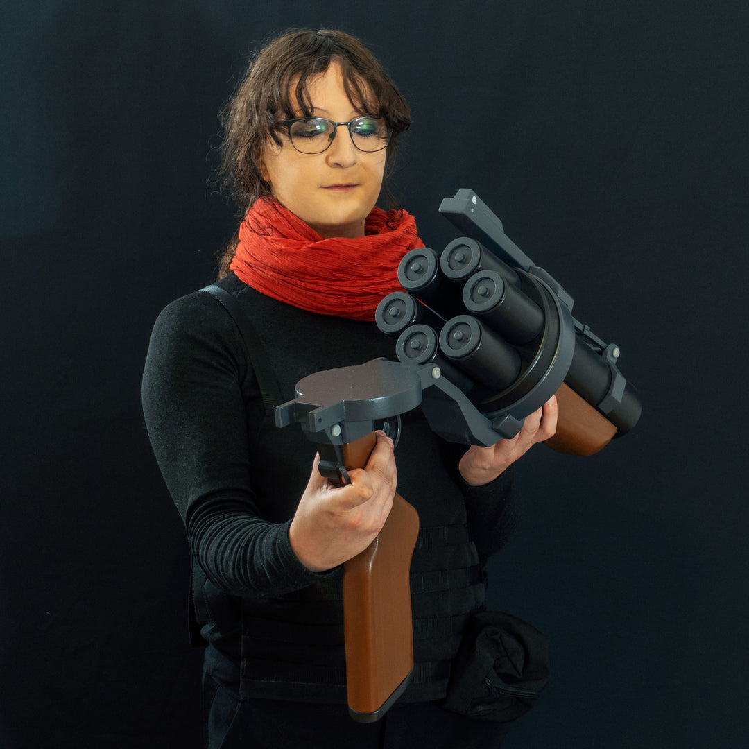 A TF2 Demoman Pipe Launcher prop with moving parts for cosplay or collection! Has the fake glowing projectiles available!  