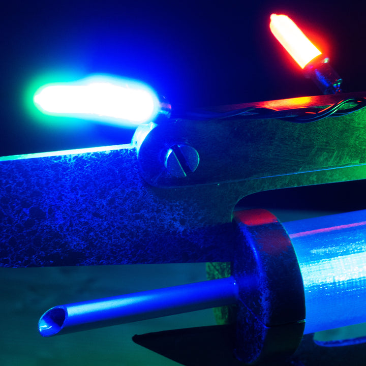 A TF2 Medic Übersaw prop with a metal paint job. Comes in Festive and with out without blood effects!