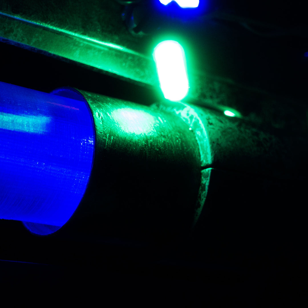 A TF2 Medic Übersaw prop with a metal paint job. Comes in Festive and with out without blood effects!