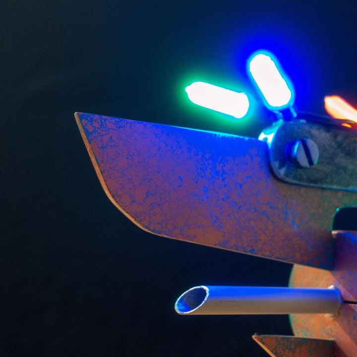 A TF2 Medic Übersaw prop with a metal paint job. Comes in Festive and with out without blood effects!