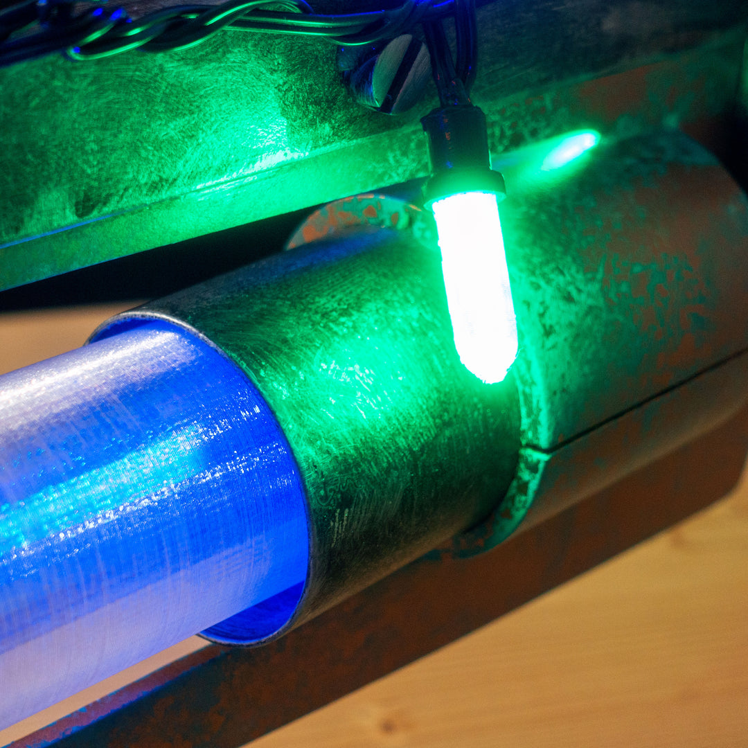 A TF2 Medic Übersaw prop with a metal paint job. Comes in Festive and with out without blood effects!