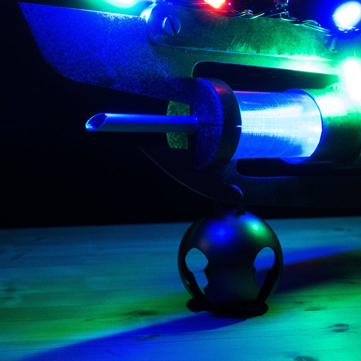 A TF2 Medic Übersaw prop with a metal paint job. Comes in Festive and with out without blood effects!