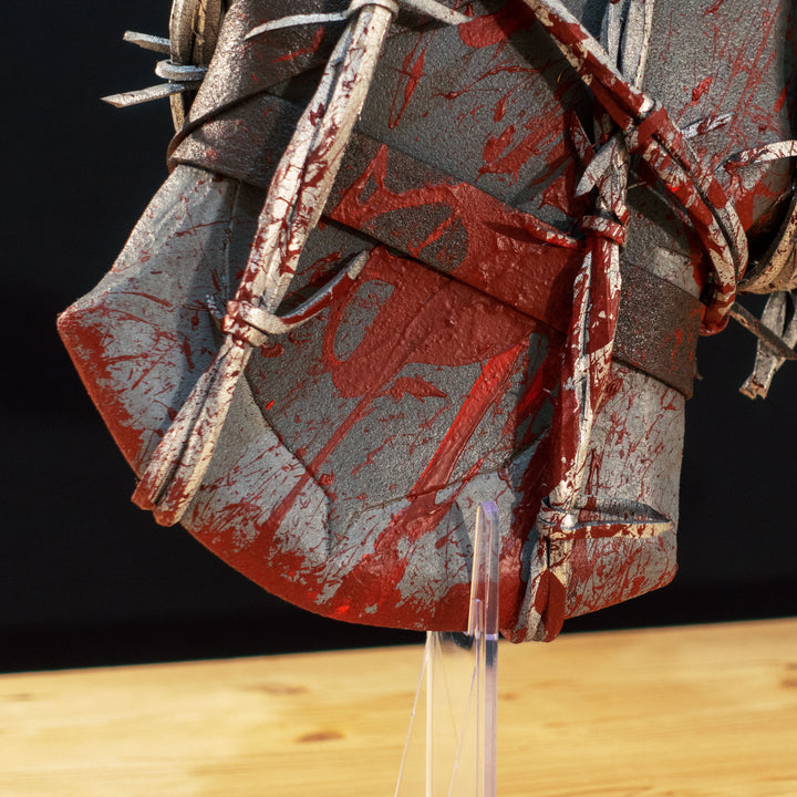 A TF2 Pyro Axtinguisher cosplay prop complete with fake barbed wires and blood splatters!