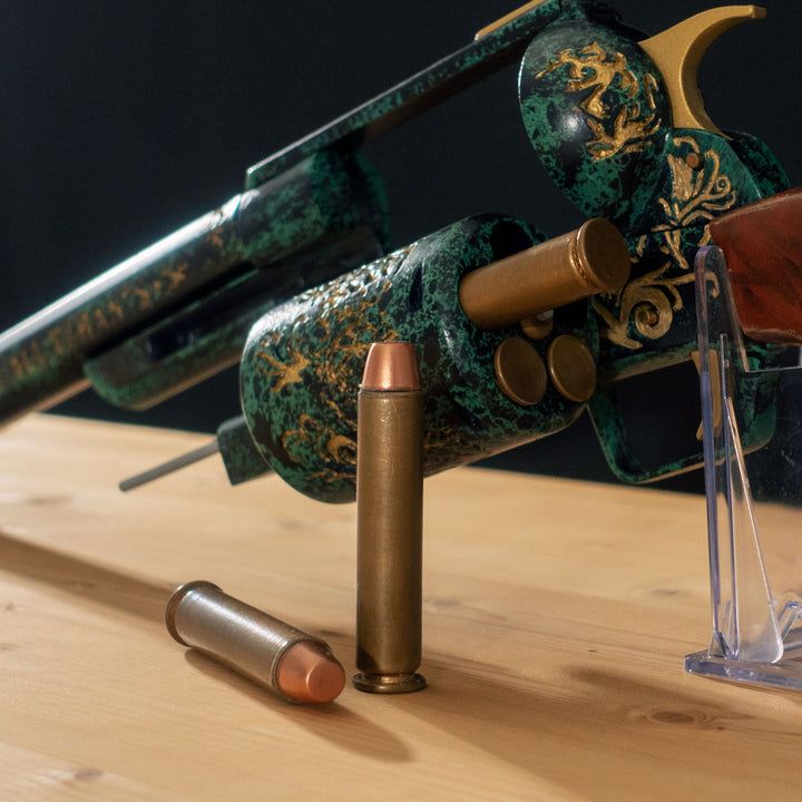 A FNV Inspired NCR Ranger Sequoia cosplay prop with a spinning cylinder that you can fill with fake 45-70 bullets and a hammer. The infill is hand painted and everything is assembled meticulously.