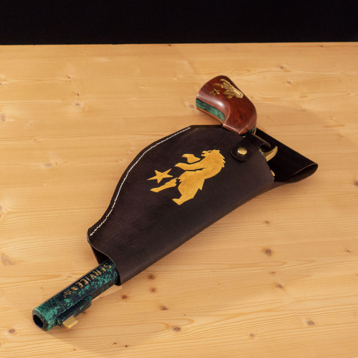 An engraved leather for our FNV inspired Ranger Sequoia cosplay prop, all filed later over the bear logo with golden pigments and hand sewn.