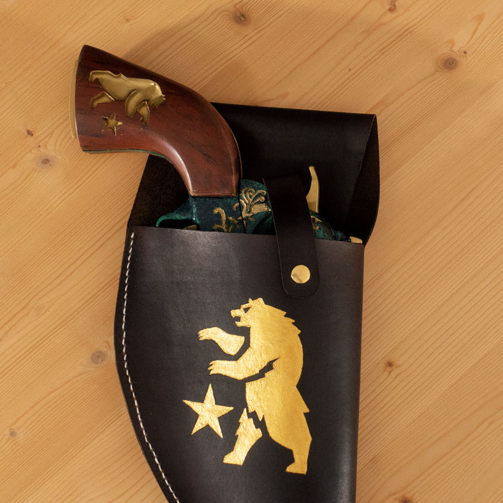 An engraved leather for our FNV inspired Ranger Sequoia cosplay prop, all filed later over the bear logo with golden pigments and hand sewn.