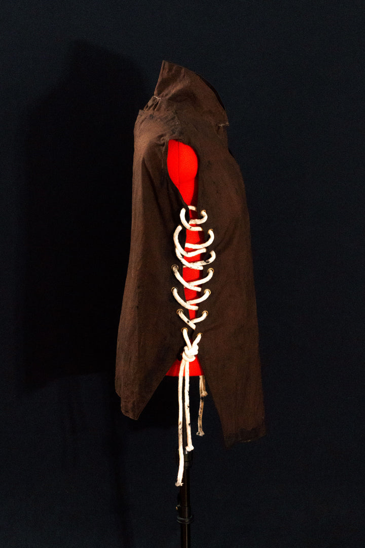 Caleb Widogast' Level 1 Undercoat from Critical Role Campaign 2! Made with demi-natte cotton canvas that has a separate neck piece. Comes either clean or weathered, good for cosplay or LARP!