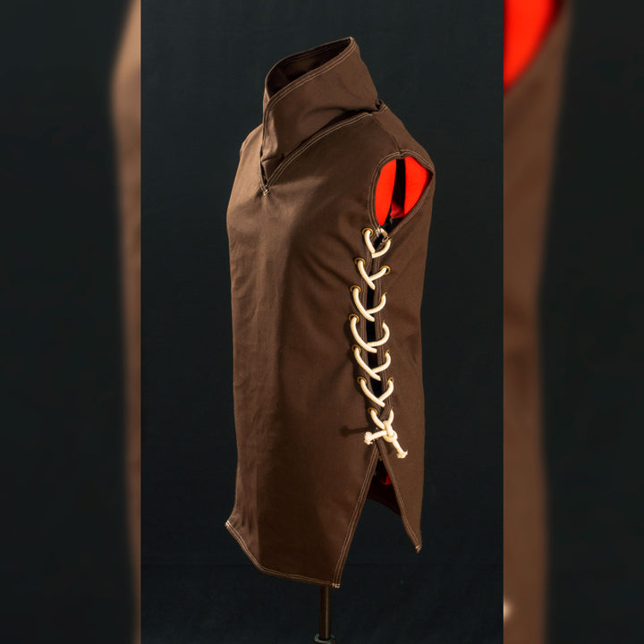 Caleb Widogast' Level 1 Undercoat from Critical Role Campaign 2! Made with demi-natte cotton canvas that has a separate neck piece. Comes either clean or weathered, good for cosplay or LARP!