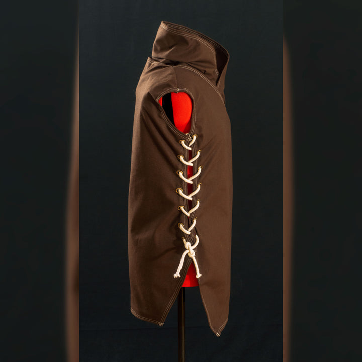 Caleb Widogast' Level 1 Undercoat from Critical Role Campaign 2! Made with demi-natte cotton canvas that has a separate neck piece. Comes either clean or weathered, good for cosplay or LARP!