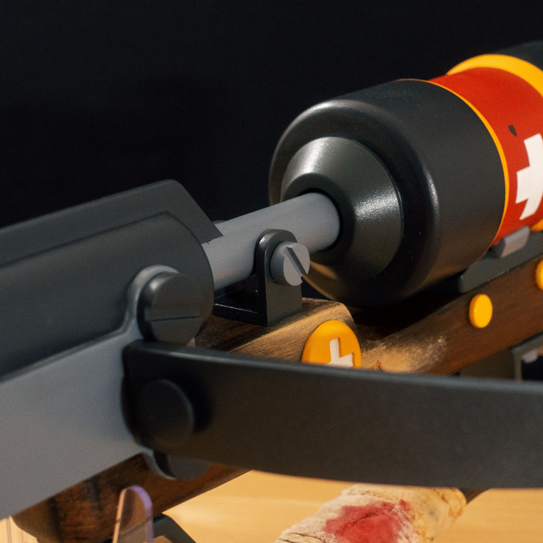 A TF2 Medic Crusader's Crossbow prop for cosplay or collection with a removable fake syringe bolt! Has all the little details from in-game like the bloody rag wrapped around the front wooden handle or small scuff all around.