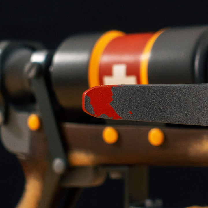 A TF2 Medic Crusader's Crossbow prop for cosplay or collection with a removable fake syringe bolt! Has all the little details from in-game like the bloody rag wrapped around the front wooden handle or small scuff all around.