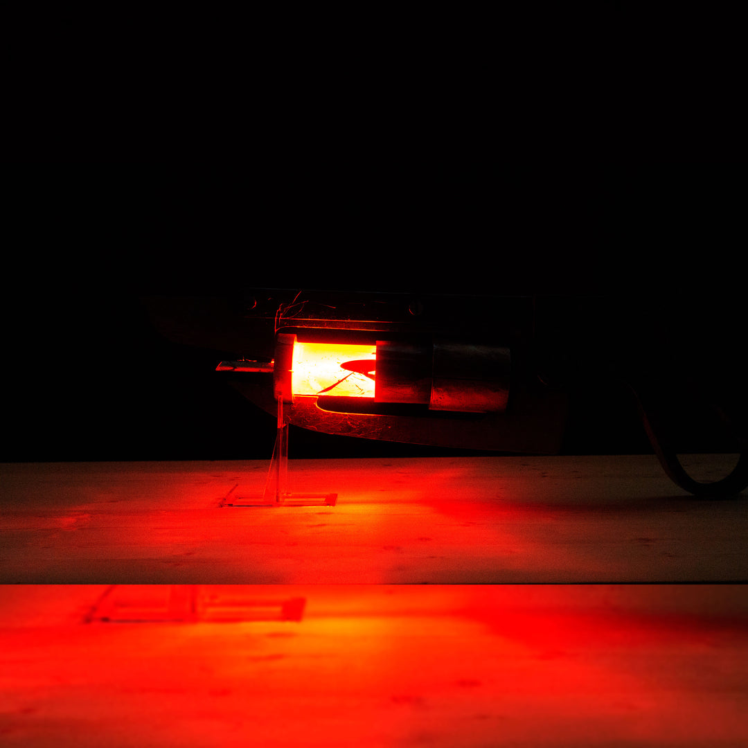 A TF2 Medic Übersaw prop with a metal paint job. Comes in Festive and with out without blood effects!