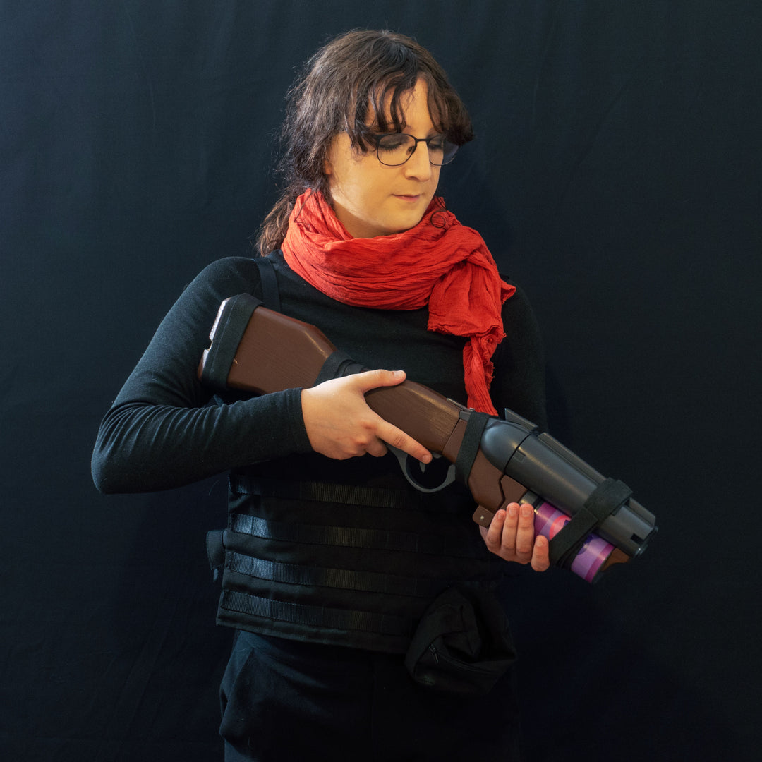 A TF2 Scout Soda Popper with moving parts, fake cartridges that slot in and wooden element! 