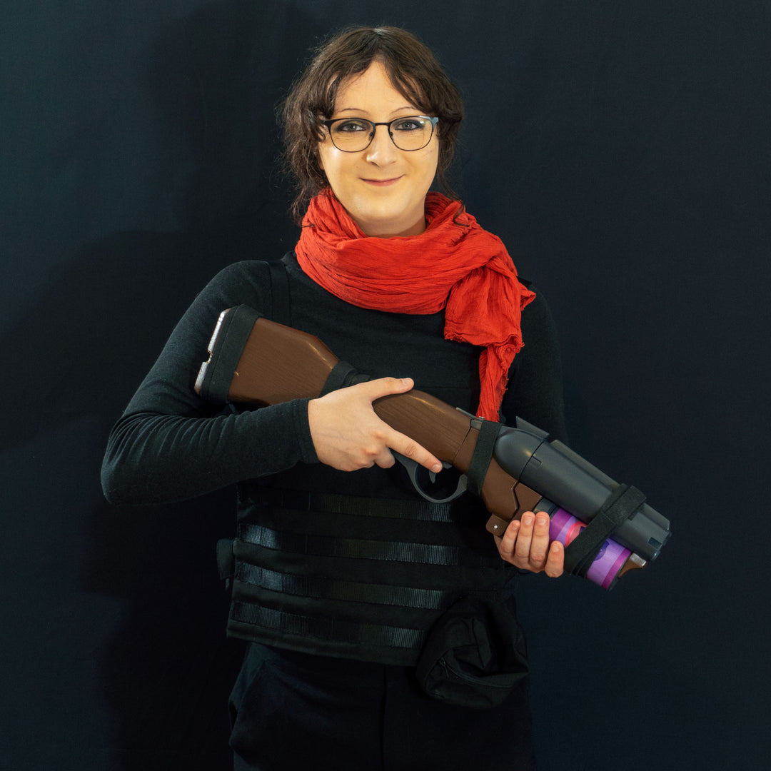 A TF2 Scout Soda Popper with moving parts, fake cartridges that slot in and wooden element! 