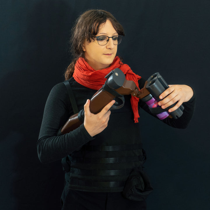 A TF2 Scout Soda Popper with moving parts, fake cartridges that slot in and wooden element! 