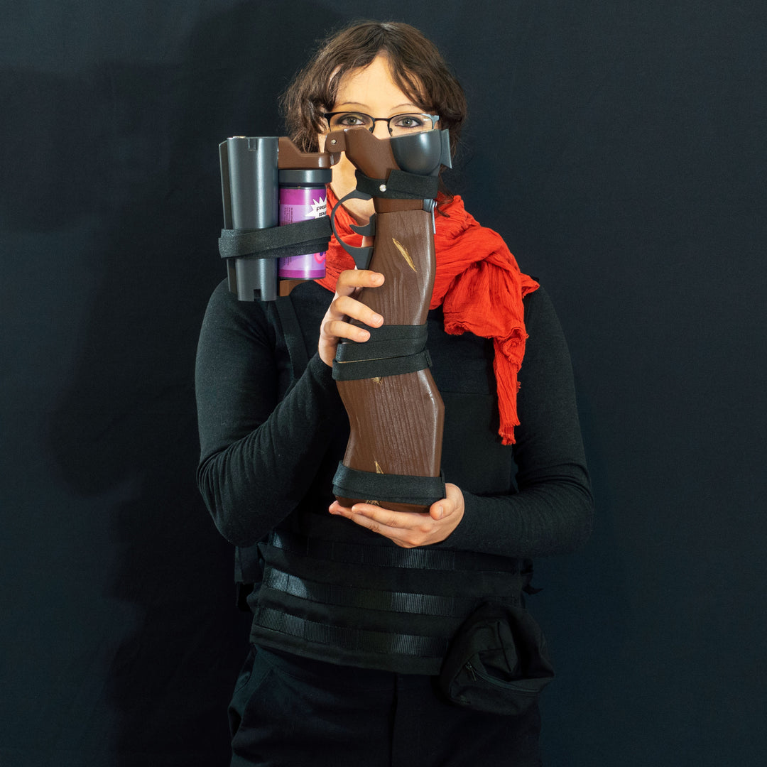 A TF2 Scout Soda Popper with moving parts, fake cartridges that slot in and wooden element! 