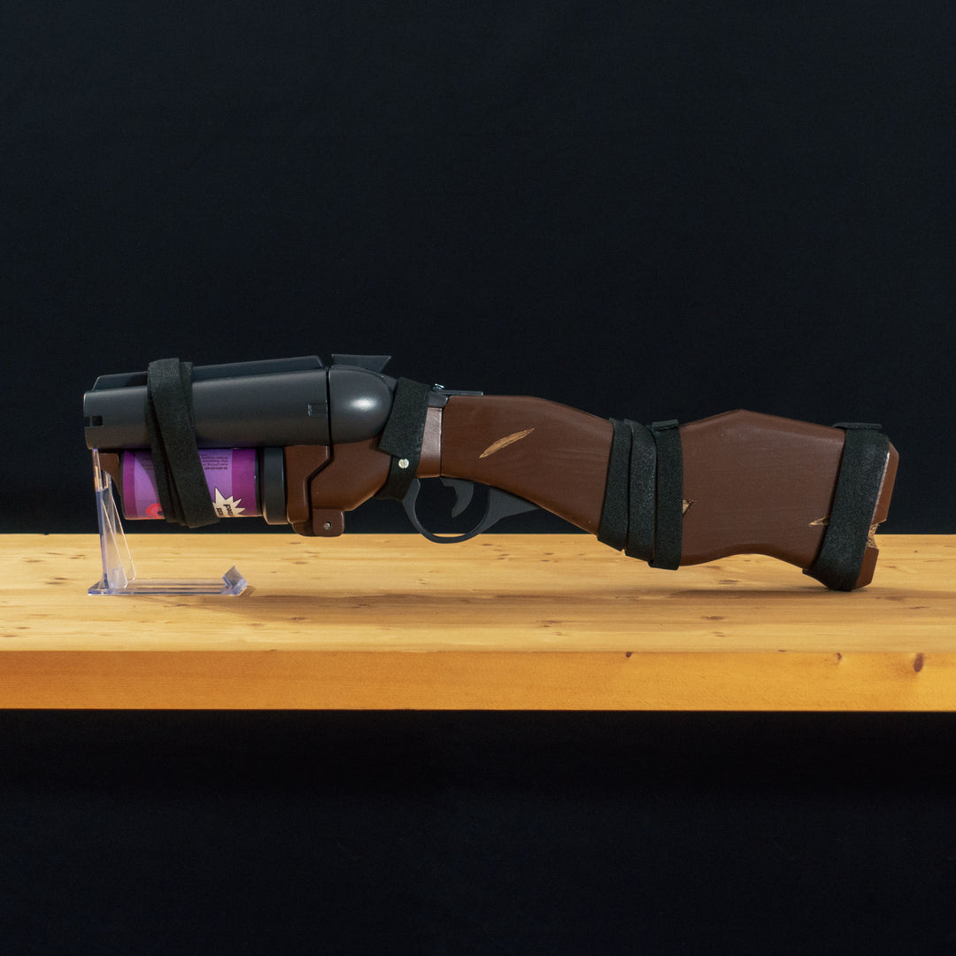 A TF2 Scout Soda Popper with moving parts, fake cartridges that slot in and wooden element! 