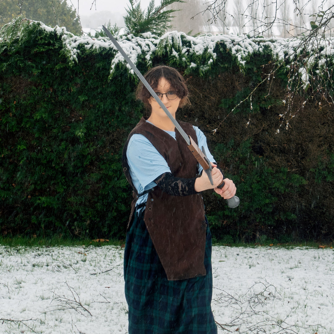 A TF2 Demoman Eyelander prop for cosplay or collection with or without blood and purple sheen! Full scale dull sword with a historically accurate weight.