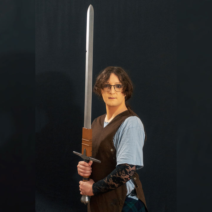 A TF2 Demoman Eyelander prop for cosplay or collection with or without blood and purple sheen! Full scale dull sword with a historically accurate weight.