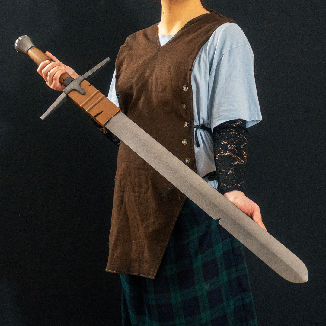 A TF2 Demoman Eyelander prop for cosplay or collection with or without blood and purple sheen! Full scale dull sword with a historically accurate weight.