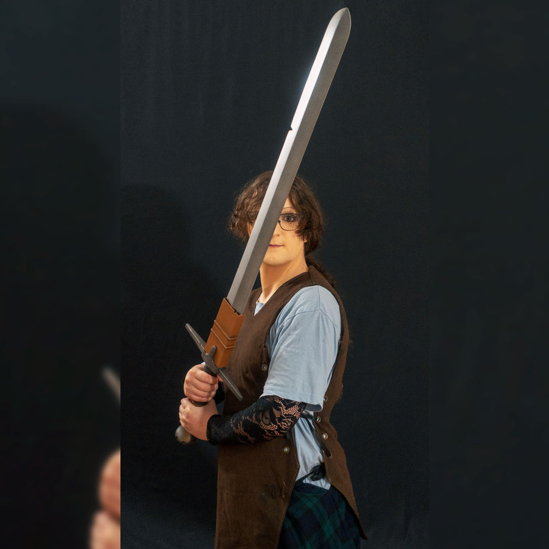 A TF2 Demoman Eyelander prop for cosplay or collection with or without blood and purple sheen! Full scale dull sword with a historically accurate weight.