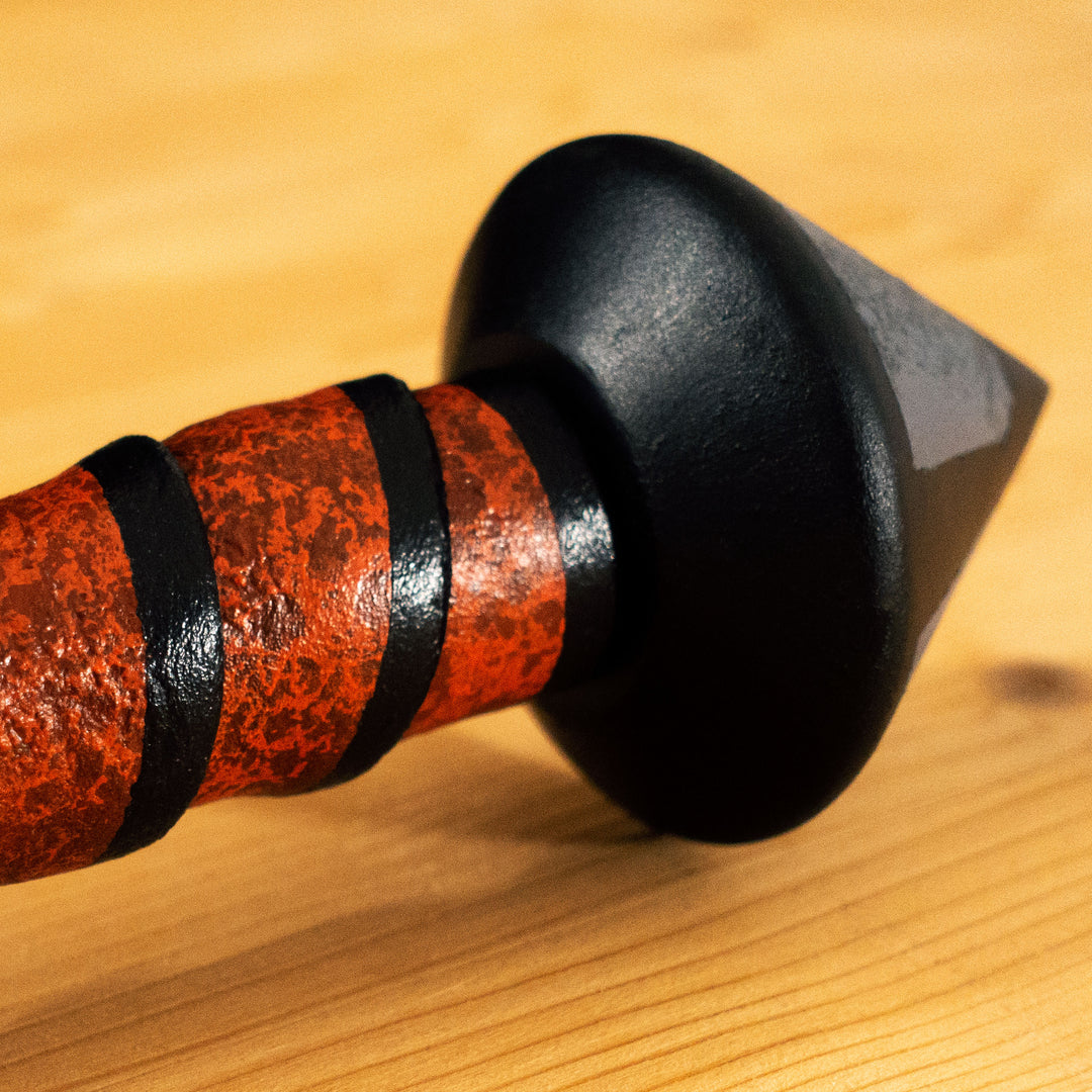 A Leper Sword cosplay prop from Darkest Dungeon with the cell-shadded look!