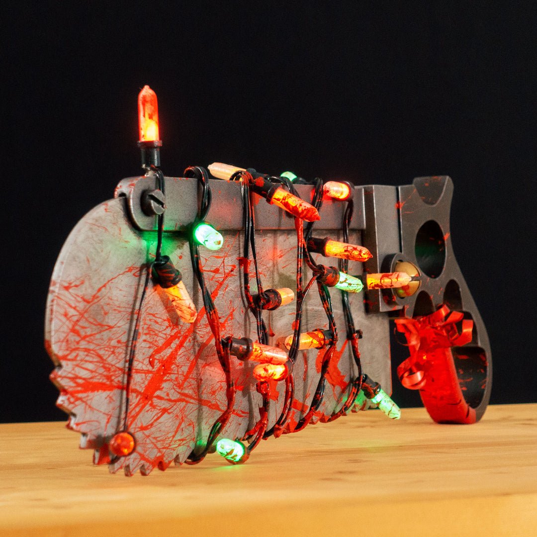 A TF2 Medic Bone Saw cosplay prop with a metal paint job! Comes in Festive and bloodied version!