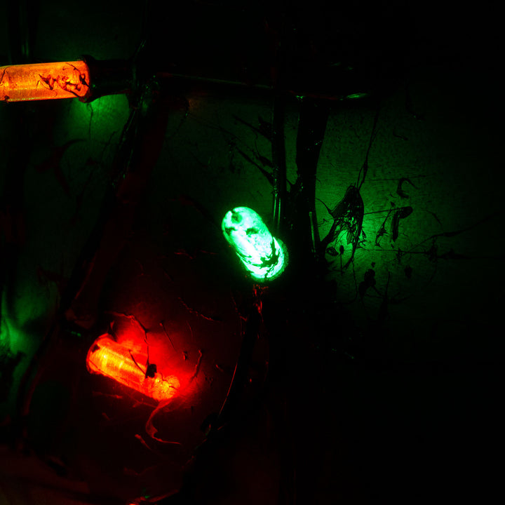 A TF2 Medic Bone Saw cosplay prop with a metal paint job! Comes in Festive and bloodied version!