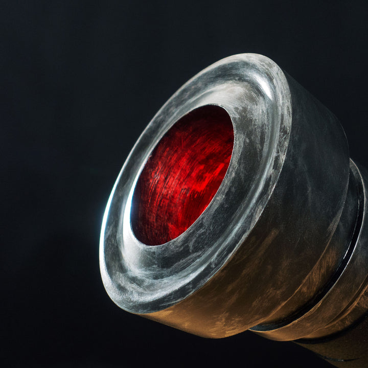 A TF2 Medic Medigun cosplay prop with a metal paint job that glows with 2 lights positions.