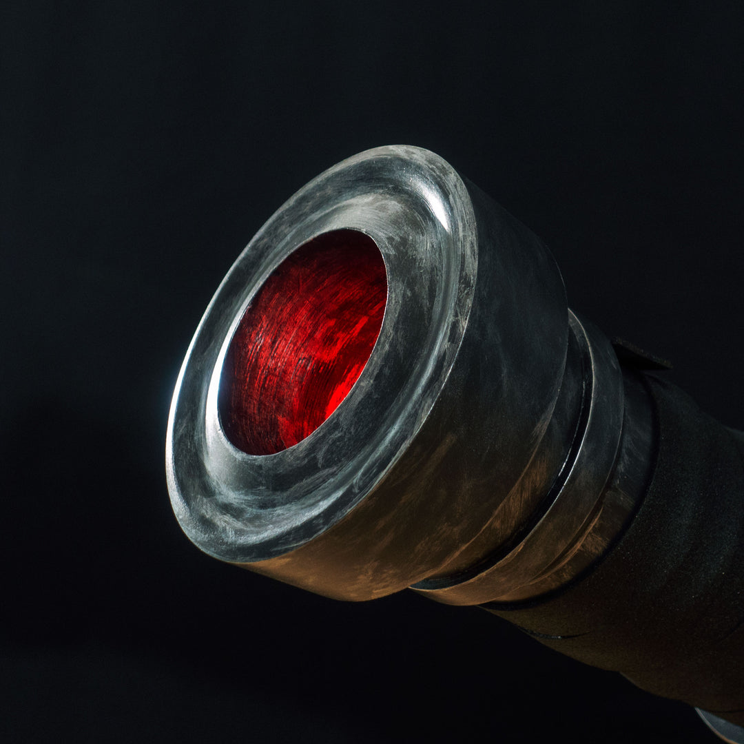 A TF2 Medic Medigun cosplay prop with a metal paint job that glows with 2 lights positions.