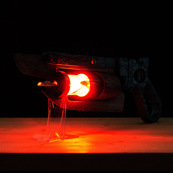 A TF2 Medic Übersaw prop with a metal paint job. Comes in Festive and with out without blood effects!