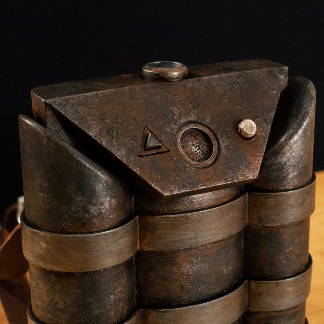 A Fallout New Vegas inspired apparatus mimicking the NCR Ranger Air Tank "backpack" with a moving air pressure gauge and 2 pressable buttons! Comes in Clean, Weathered and Rusty versions! Straps are vegetabled leather.