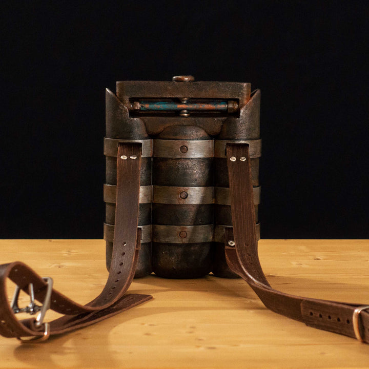 A Fallout New Vegas inspired apparatus mimicking the NCR Ranger Air Tank "backpack" with a moving air pressure gauge and 2 pressable buttons! Comes in Clean, Weathered and Rusty versions! Straps are vegetabled leather.