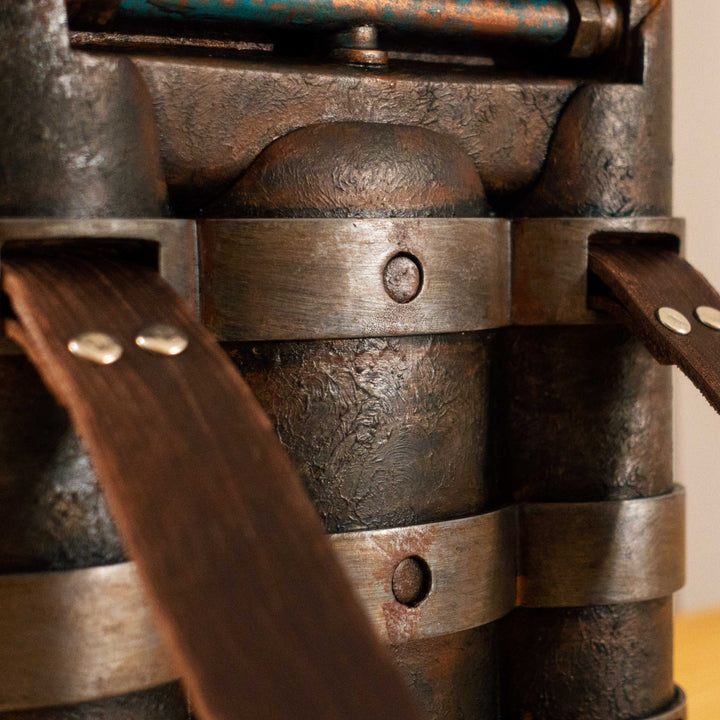 A Fallout New Vegas inspired apparatus mimicking the NCR Ranger Air Tank "backpack" with a moving air pressure gauge and 2 pressable buttons! Comes in Clean, Weathered and Rusty versions! Straps are vegetabled leather.