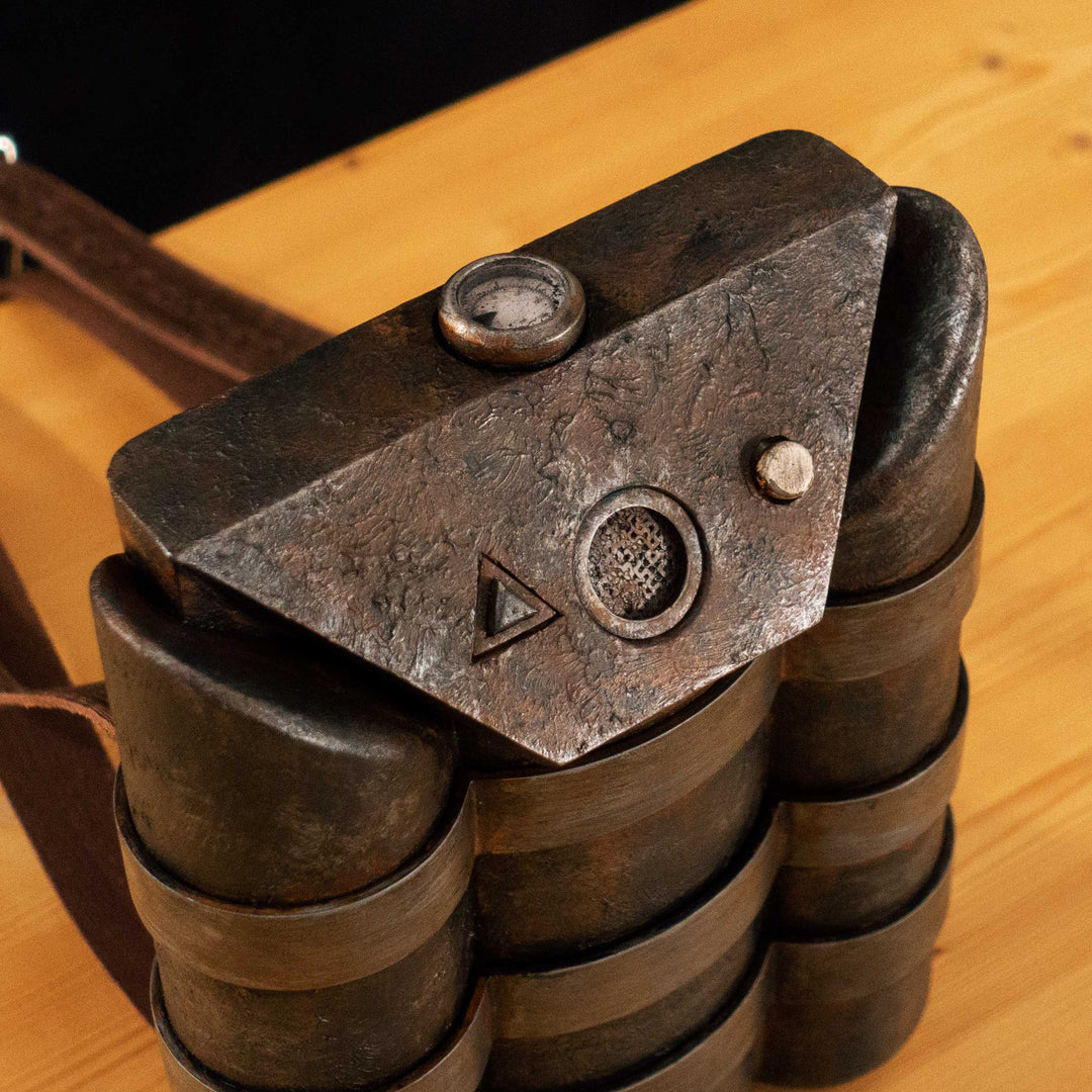 A Fallout New Vegas inspired apparatus mimicking the NCR Ranger Air Tank "backpack" with a moving air pressure gauge and 2 pressable buttons! Comes in Clean, Weathered and Rusty versions! Straps are vegetabled leather.