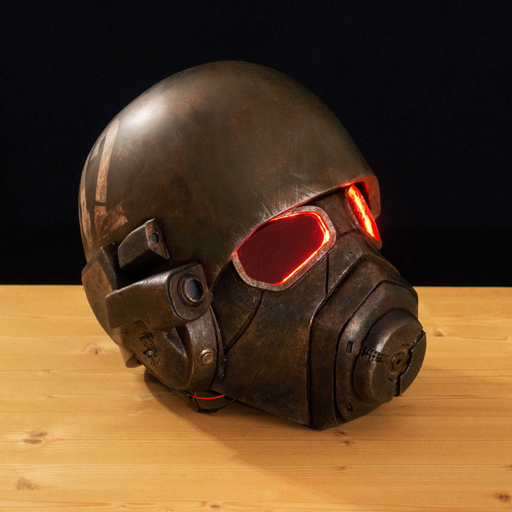 An Inspired Fallout New Vegas 2 parts helmet featuring the well knows NCR Ranger Helmet function. Lenses glow no matter the light, and it has side lights on the right side controlled at the right ear piece control panel. Has a fan inside to wick out moisture so you can be comfortable while wearing it for extended period of time. inside is padded with vegetable leather and a chin strap for align your vision with the lenses no matter your build.