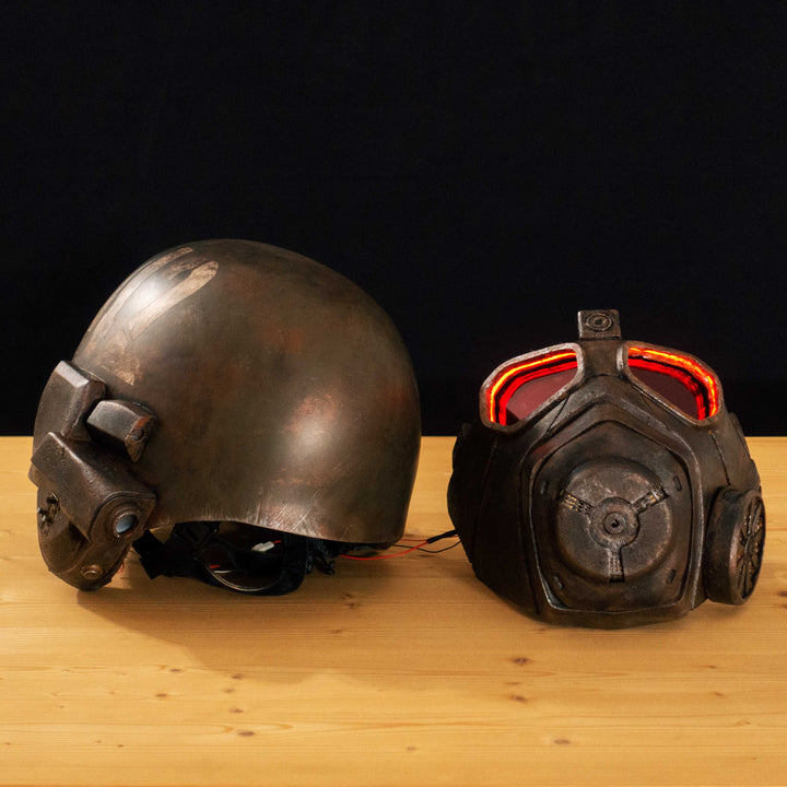 An Inspired Fallout New Vegas 2 parts helmet featuring the well knows NCR Ranger Helmet function. Lenses glow no matter the light, and it has side lights on the right side controlled at the right ear piece control panel. Has a fan inside to wick out moisture so you can be comfortable while wearing it for extended period of time. inside is padded with vegetable leather and a chin strap for align your vision with the lenses no matter your build.