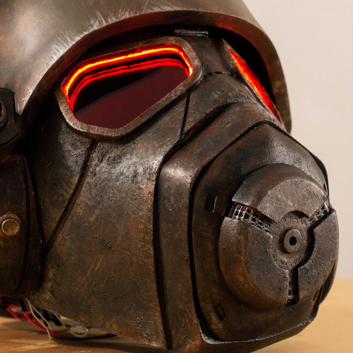 An Inspired Fallout New Vegas 2 parts helmet featuring the well knows NCR Ranger Helmet function. Lenses glow no matter the light, and it has side lights on the right side controlled at the right ear piece control panel. Has a fan inside to wick out moisture so you can be comfortable while wearing it for extended period of time. inside is padded with vegetable leather and a chin strap for align your vision with the lenses no matter your build.