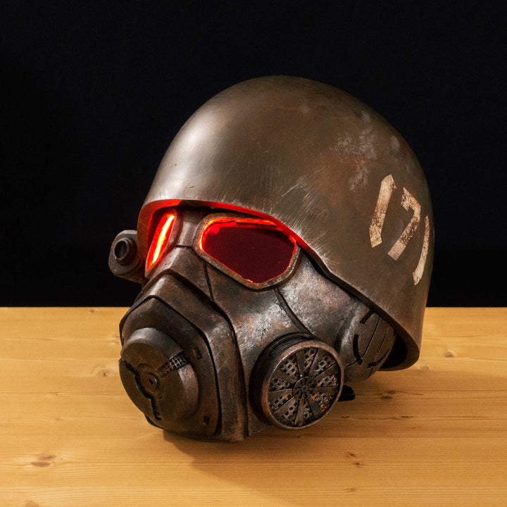 An Inspired Fallout New Vegas 2 parts helmet featuring the well knows NCR Ranger Helmet function. Lenses glow no matter the light, and it has side lights on the right side controlled at the right ear piece control panel. Has a fan inside to wick out moisture so you can be comfortable while wearing it for extended period of time. inside is padded with vegetable leather and a chin strap for align your vision with the lenses no matter your build.