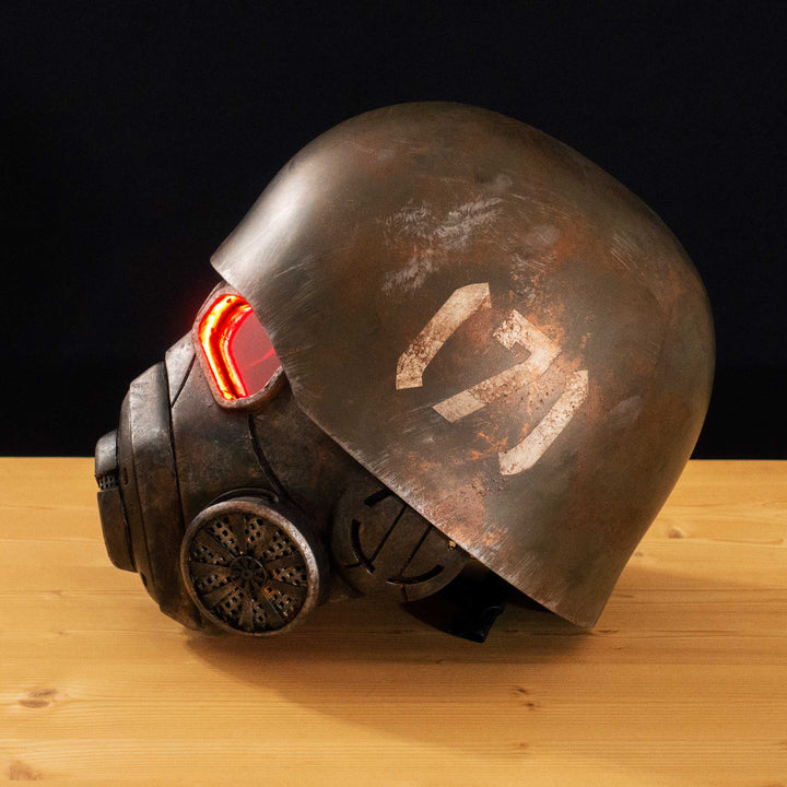 An Inspired Fallout New Vegas 2 parts helmet featuring the well knows NCR Ranger Helmet function. Lenses glow no matter the light, and it has side lights on the right side controlled at the right ear piece control panel. Has a fan inside to wick out moisture so you can be comfortable while wearing it for extended period of time. inside is padded with vegetable leather and a chin strap for align your vision with the lenses no matter your build.