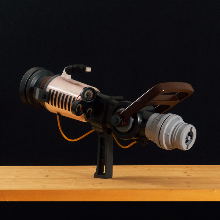 A TF2 Medic Qui-Fix cosplay prop that has two light function for its glowing barrel that is feature in Meet the Real Medic.