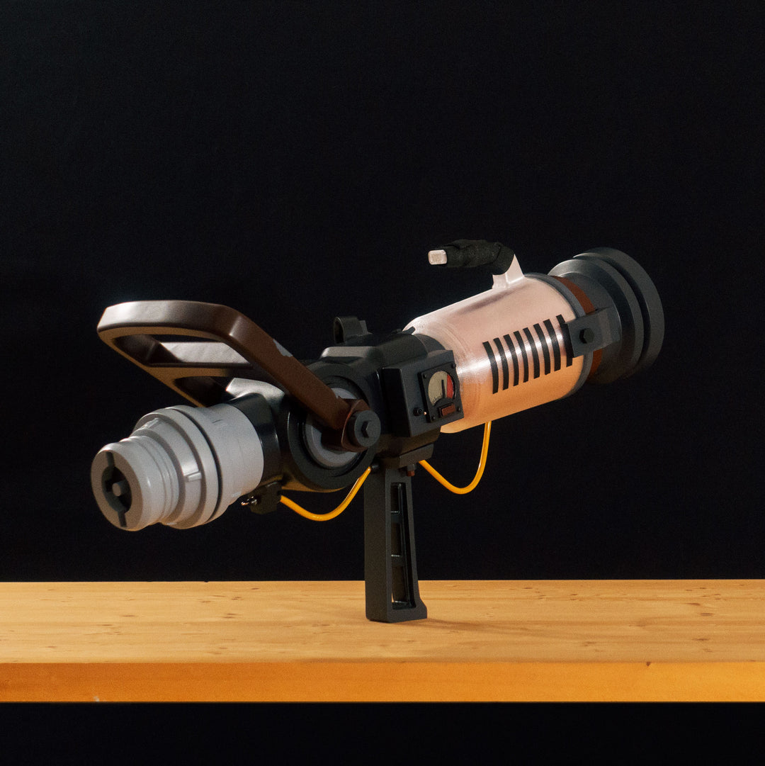 A TF2 Medic Qui-Fix cosplay prop that has two light function for its glowing barrel that is feature in Meet the Real Medic.