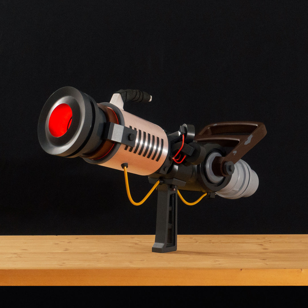 A TF2 Medic Qui-Fix cosplay prop that has two light function for its glowing barrel that is feature in Meet the Real Medic.