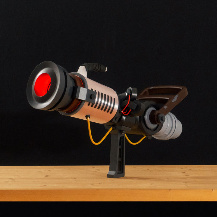 A TF2 Medic Qui-Fix cosplay prop that has two light function for its glowing barrel that is feature in Meet the Real Medic.