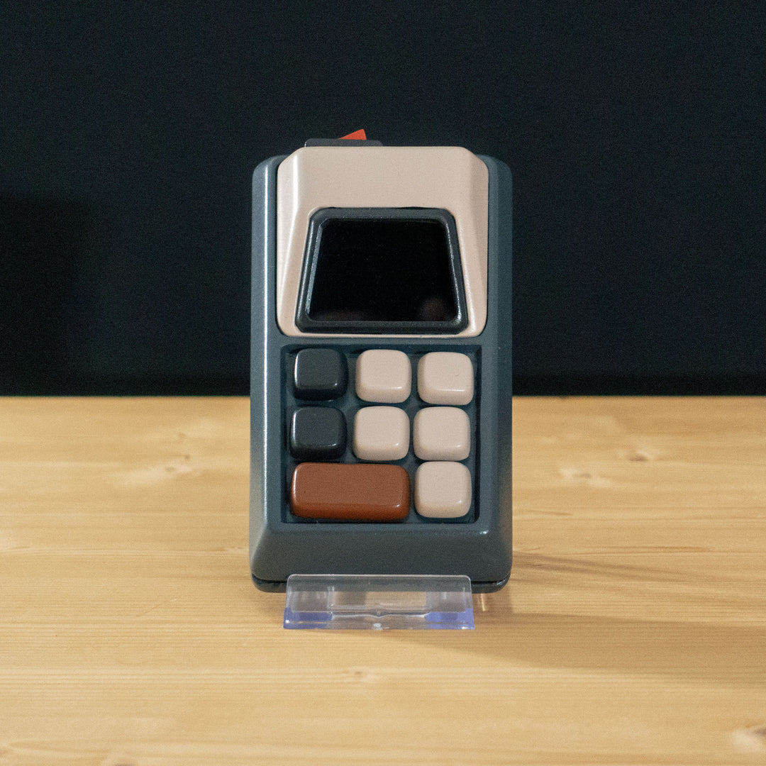A TF2 Engineer Construction PDA prop for cosplay or collection with pressable and toggleable buttons!