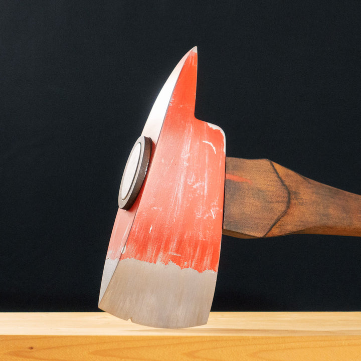 A TF2 Pyro Fire Axe cosplay prop with a Metal paint job
